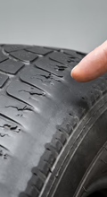 Uneven tire wear pattern caused by suspension or alignment issues